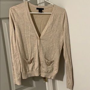 Cream cardigan with cute buttons and pockets